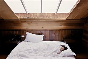 woman sleeping on side